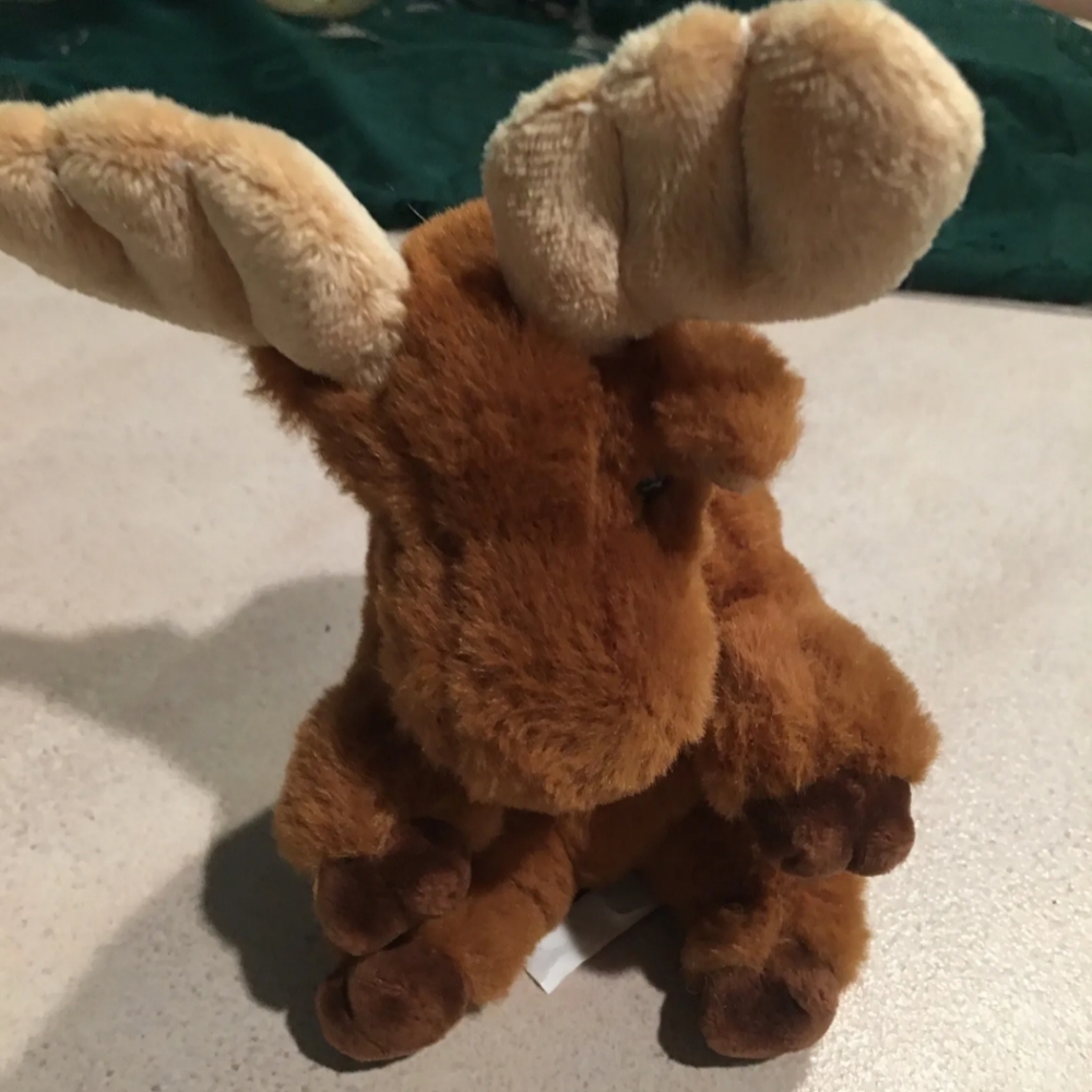 A charming Douglas The Cuddle Toy Moose Plush in a lovely brown color  7-in